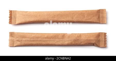 Two Sugar Stick. Sugar in paper kraft packaging. Mock up for design isolated on white background Stock Photo