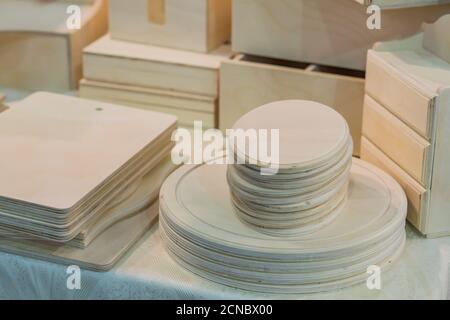 unused brand new handmade wooden dish plates and boards for  coloring, folk art, crafts Stock Photo