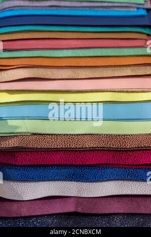 Leather samples of different colors for interior design and craft. Background texture. Stock Photo
