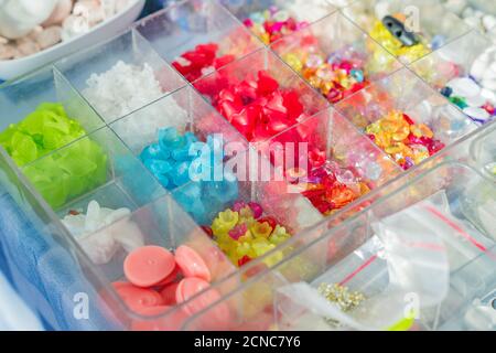 Colorful mix of glass beads. Variety of shapes and colors to make necklaces or bracelets. DIY materials Stock Photo