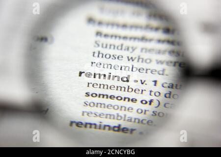 Definition of word remind in dictionary Stock Photo - Alamy
