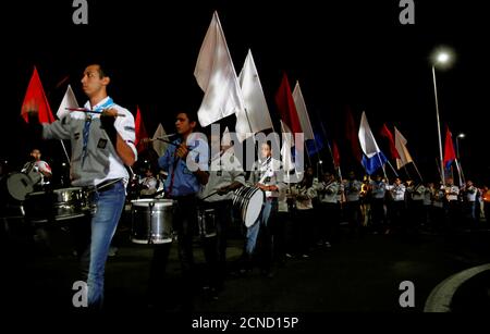 People playing drums march to the 'Peace Square' during a ceremony to mark the first anniversary of the Russian MetroJet plane crash in the Red Sea resort of Sharm el-Sheikh, Egypt, October 30, 2016. REUTERS/Amr Abdallah Dalsh