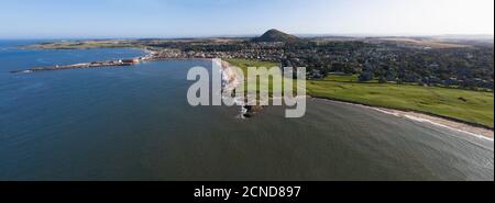 Aerial panoramic view of the West Links and town centre, North Berwick, East Lothian, Scotland.