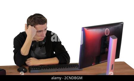 Upset gamer expressing disappointment watching online game on wh Stock Photo