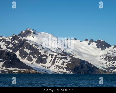 Snow-covered mountains in King Haakon Bay, South Georgia, Polar Regions Stock Photo