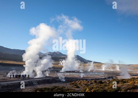 Tourists at the Geysers del Tatio (El Tatio), the third largest geyser field in the world, Andean Central Volcanic Zone, Antofagasta Region, Chile Stock Photo