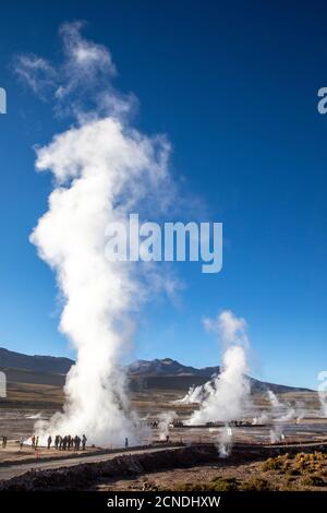 Tourists at the Geysers del Tatio (El Tatio), the third largest geyser field in the world, Andean Central Volcanic Zone, Antofagasta Region, Chile Stock Photo