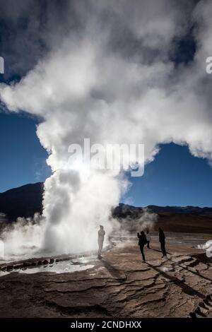 Tourists at the Geysers del Tatio (El Tatio), the third largest geyser field in the world, Andean Central Volcanic Zone, Antofagasta Region, Chile Stock Photo