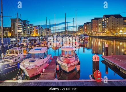 A dusk view of the modernised harbour and marina at Portishead, near Bristol, in Somerset, England, United Kingdom, Europe Stock Photo