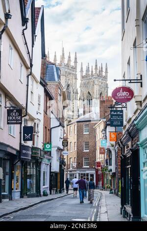 Low Petergate leading to York Minster, York, North Yorkshire, England, United Kingdom, Europe Stock Photo