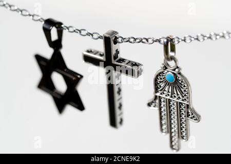 Religious symbols of Christianity, Islam and Judaism, the three monotheistic religions, Interfaith dialogue, France, Europe Stock Photo