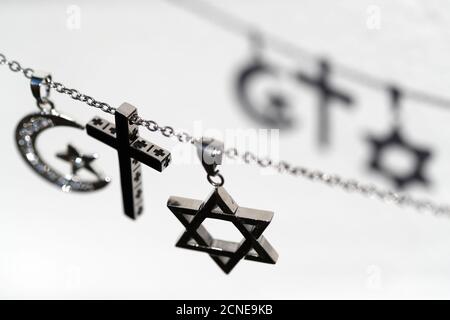 Religious symbols of Christianity, Islam and Judaism, the three monotheistic religions, Interfaith dialogue, France, Europe Stock Photo