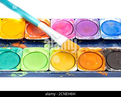 Paint box of water color with brush isolated Stock Photo