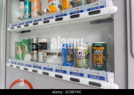 Smashed and broken drinks vending machine in Tenninkyo, Hokkaido, Japan Stock Photo