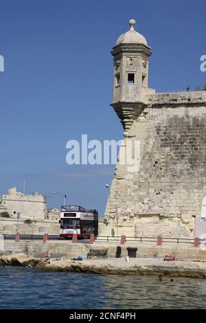 A medieval turret and battlements on Fort Ricasoli, a bastioned fort in Kalkara, Malta Stock Photo