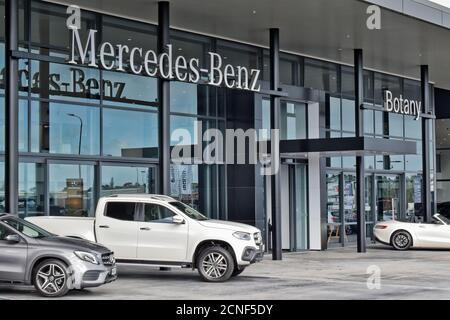 Mercedes Benz Showroom With Sign Board Above Entrance Test Drive Cars Parked In Front Of The Store Stock Photo Alamy