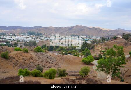 Lake Elsinore, California, USA, panoramic view over a industrial area and distant hill landscape Stock Photo