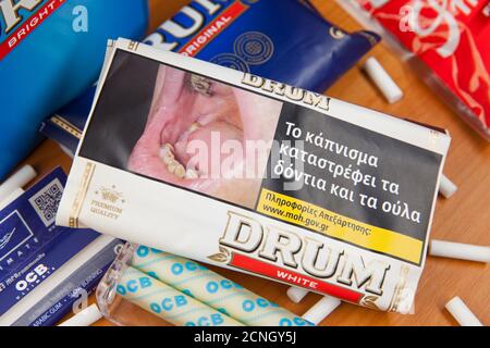 Moscow, Russia - September 17, 2020: Pouch of Drum White rolling tobacco and smoking accessories Stock Photo