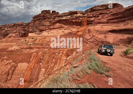 Sudden waterfall created by flash flood on Aug 18, 2010, destroying Mineral Road going down to Green River Canyon at Canyonlands Nat Park, Utah, USA Stock Photo