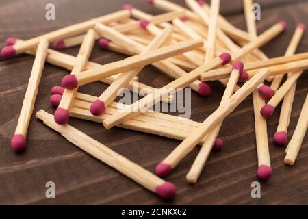 Matches on a white isolated background. Matches on a wooden background. Matches. Stock Photo