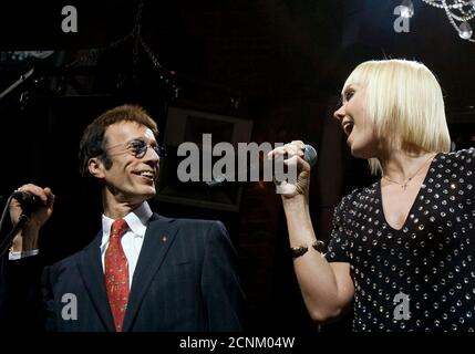 Russian Singer Valeriya R And Former Bee Gees Singer Robin Gibb Perform During An Album Release