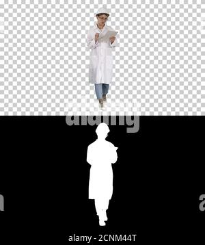Woman engineer working on tablet, Alpha Channel Stock Photo