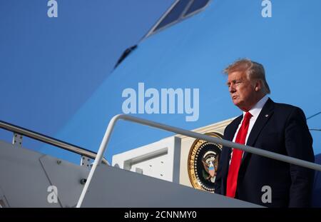 U.S. President Donald Trump deplanes from Air Force One as he returns to Washington after travel to the Kennedy Space Center in Florida at Joint Base Andrews, Maryland, U.S., May 27, 2020. REUTERS/Jonathan Ernst