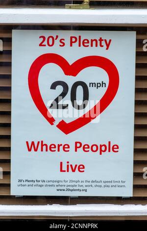 Sign or notice reading 20's plenty, 20 mph, where people live Stock Photo