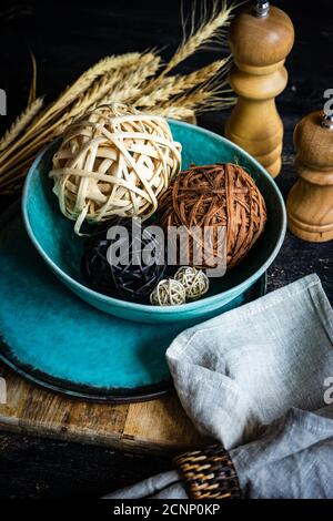 Rustic autumn table setting with ornamental balls Stock Photo