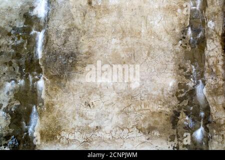 Aged old dirty concrete cracked wall texture or background Stock Photo