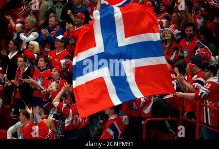 Norway's fans cheer their team on during their 2013 IIHF Ice Hockey World Championship preliminary round match against Denmark at the Globe Arena in Stockholm May 5, 2013. REUTERS/Arnd Wiegmann (SWEDEN  - Tags: SPORT ICE HOCKEY)