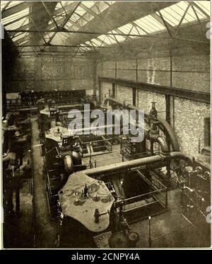 . The Street railway journal . GENERAL VIEW OF ENGINE ROOM TRAVELER OF OVERHEAD CRANE IN POWER STATION lamps, and station switches are fixed which control the incan-descent lamps in the tunnel half-way to the next station in eachdirection. The lamps are placed five in series, and the circuitsare run so that there is never more than the voltage of one lampbetween two adjacent wires in the same pipe. Special throw-over switches are provided to take the lightingcurrent from the conductor rails when the spe-cial lighting cables are not charged. PERSONNELThe chairman of the board of directors ofthe Stock Photo