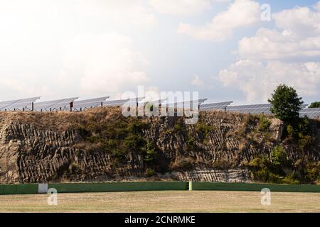 Large group of solar panels on the hill, photovoltaic power green environment energy supply Stock Photo