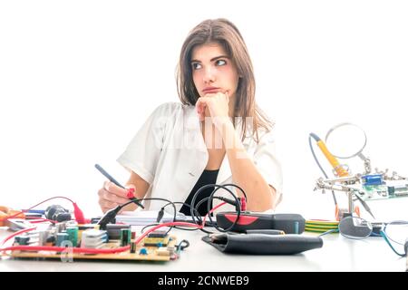 Woman Repairing Computer Part, Service Center, Electronics Repair Service Stock Photo