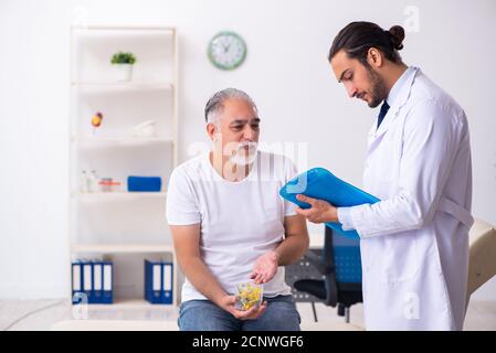 Patient suffering from the diabetes visiting doctor Stock Photo