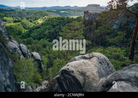 Saxony, Germany. Beautiful landscape of famous Bastei rock formation. Elbe Sandstone Mountains and river down the valley. Jutted out rock pillars and Stock Photo