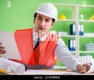 The man architect working on the project Stock Photo