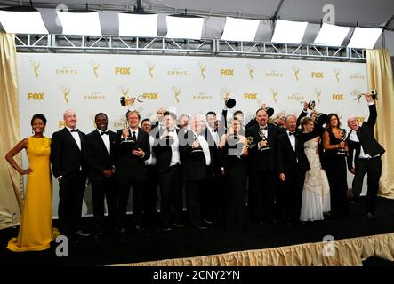 The cast and crew, including actress Julia Louis-Dreyfus, of HBO's 'Veep' hold the awards for Outstanding Comedy Series backstage during the 67th Primetime Emmy Awards in Los Angeles, California September 20, 2015.  REUTERS/Mike Blake