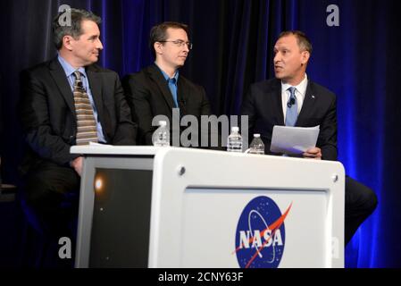 Associate Administrator for NASA's Science Mission Directorate Thomas Zurbuchen (R) makes remarks as University of Liege (Belgium) astronomer Michael Gillon (C) and Sean Carey of NASA's Spitzer Science Center listen during a news conference to present new findings on exoplanets, planets that orbit stars other than Earth's sun, in Washington, U.S., February 22, 2017. REUTERS/Mike Theiler