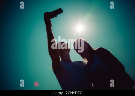 Young couple man and woman taking a selfie on holiday Stock Photo