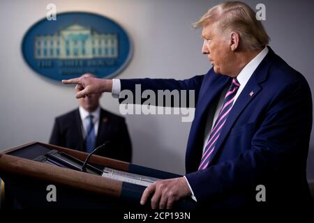 US President Donald J. Trump responds to a question from the news media ...