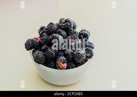 Black Raspberries In Small Dish Stock Photo