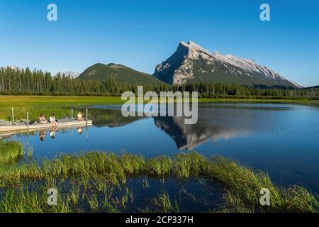 Friends enjoying the end of summer season at Vermilion Lakes near Banff Town in Banff National Park, Alberta, Canada. Stock Photo