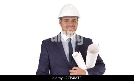 Smiling architect or engineer walking while keeping projects in arms Labor concept on white background. Stock Photo