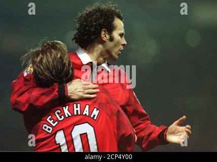 Manchester United soccer star Ryan Giggs (R) celebrates his first goal against Wimbledon with teammate David Beckham January 29. The game today at Old Trafford is part of the FA Carling Premiership.  SPORT  SOCCER