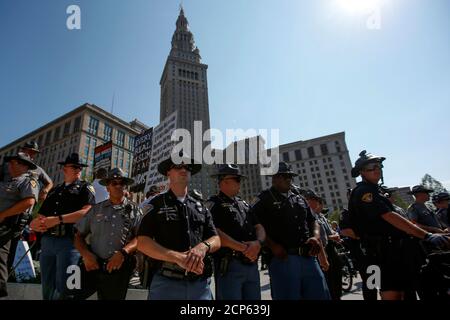 Security forces stand guard in Cleveland Public Square in downtown Cleveland during the Republican National Convention in Ohio, U.S., July 19, 2016. REUTERS/Adrees Latif