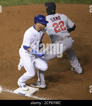 Chicago, United States. 18th Sep, 2020. Chicago Cubs' Willson Contreras (L) is safe at first base after hitting a single as Minnesota Twins' Miguel Sano (22) waits for the ball in the third inning at Wrigley Field on Friday, September 18, 2020 in Chicago. Photo by Kamil Krzaczynski/UPI Credit: UPI/Alamy Live News Stock Photo