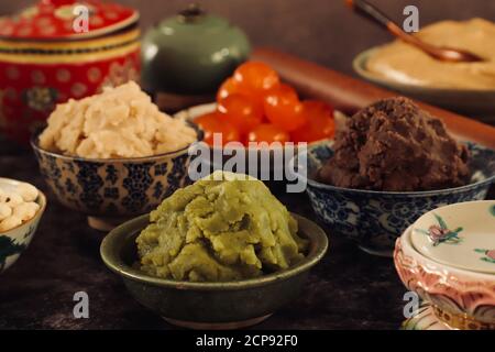 Assorted Sweet Pastes, Salted Egg Yolks and Skin Dough for Yue Bing Mooncake Stock Photo