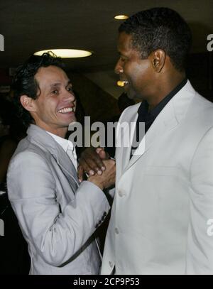 Actor Denzel Washington and his film co-star Kimberly Elise pose at the