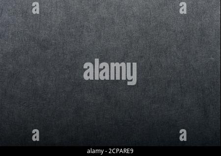 Grungy gradient dark paper background close up view Stock Photo